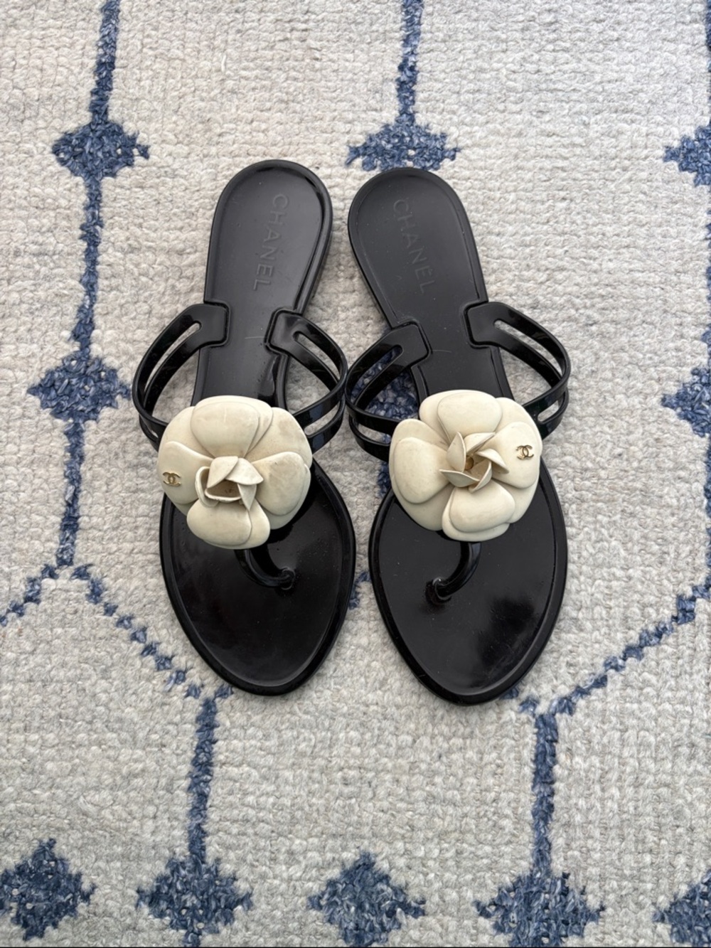 CHANEL Black Jelly Sandal with Cream Camellia Accent